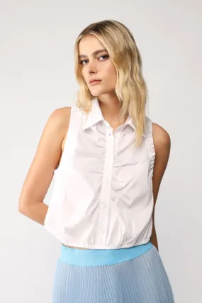 Camicia smanicata cropped monocolour con colletto classico